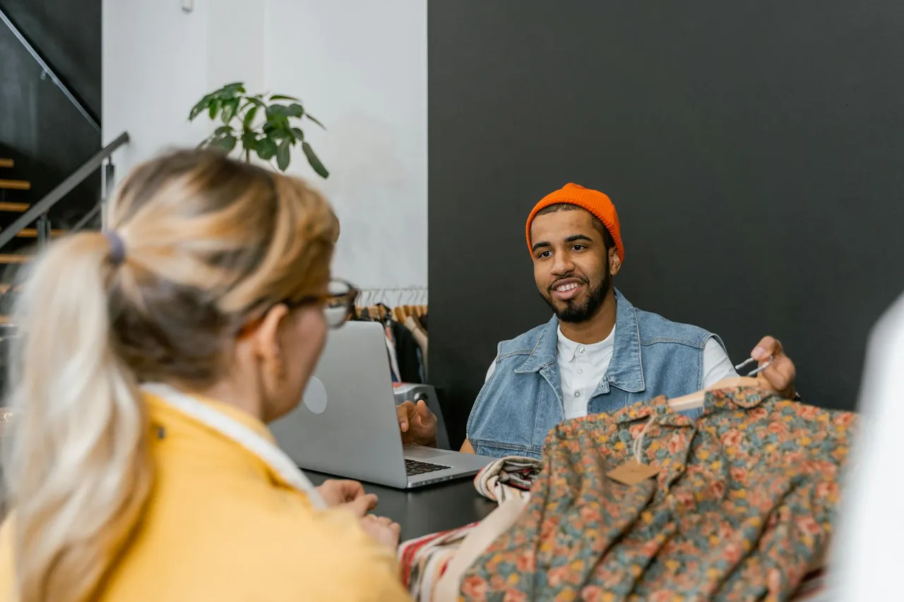 Small business owner interacting with a customer online, showing personalized service and trust